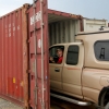 28_Loading_the_Golden_Boy_into_the_shipping_container