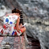 25_Writing_in_her_journal_on_the_castle_wall