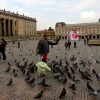 07-a-little-girl-feeding-the-pigions-in-the-main-plaza