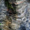 28-the-streched-and-strained-pattern-of-ancient-solidified-lava-exposed-by-errosion-from-the-waterfall