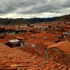 01-clay-tiled-roofs-dminate-the-view-of-cusco