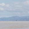 06-other-trucks-traveling-on-the-salt-flat-looked-like-little-black-floating-dots-that-flew-across-the-surface