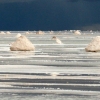 22-at-the-edge-of-the-salar-the-locals-mine-the-salt-piling-it-into-big-mounds-for-the-trucks-to-come-pick-up