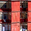 13-a-bright-red-apartment-building