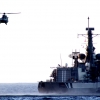 23-a-hellicopter-was-practicing-landing-on-the-back-of-the-navy-gunship