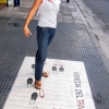 07-kacey-learning-the-steps-to-the-tango-painted-on-the-sidewalk