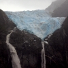 18-the-queulet-hanging-glacier-sits-hundreds-of-feet-above-a-vertical-cliff