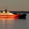 03-our-brillantly-red-ferry-plying-the-calm-waters-of-the-straights-of-magellan