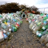 09-a-typical-road-side-shrine-adorned-with-hundreds-of-water-filled-plastic-bottles-there-were-dozens-of-these-along-the-southern-highways