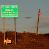 01-a-warning-sign-at-the-tierra-del-fuego-ferry-landing-a-poingent-reminder-that-chile-and-argentina-are-still-at-odds-over-their-soverign-claims-to-southern-patagonia