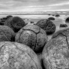 09-as-the-cliffs-wore-away-and-the-boulders-were-exposed-in-the-face-they-would-eventually-tumble-out-onto-the-beach