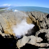 08-the-pounding-surf-periodically-sends-up-huge-gysers-of-water-through-blowholes-in-the-rock-formation