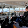 28-captain-kacey-at-the-helm