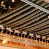 12-the-thousands-of-cables-running-from-the-detectors-outside-in-the-ice-are-run-up-the-tall-silver-towers-on-the-outside-of-the-building-and-brought-in-at-a-central-point