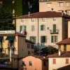 29-our-apartment-rental-was-the-2-windows-with-green-shutters-on-the-grey-building-behind-the-albergo-milano-not-bad